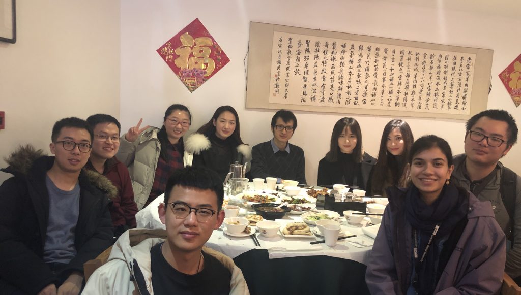 The group celebrates Chinese New Year 2019 in Bloomsbury. [From front left] Ruoyu Xu, Liqun Kang, Lin Sheng, Qiming Wang, Ryan Wang, Master's students and Sushila Marlow